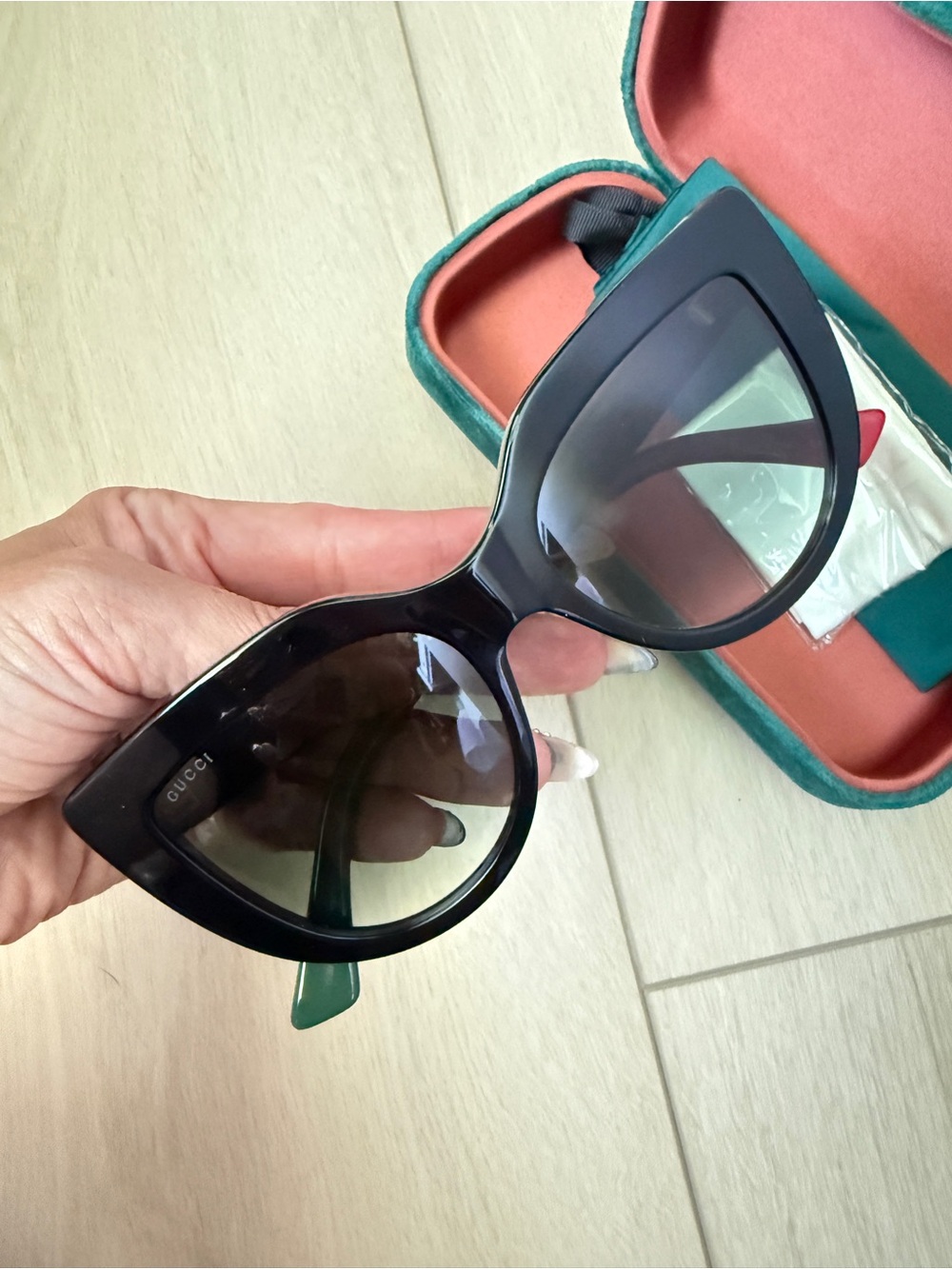 Authentic Gucci Oversized Cat-Eye Sunglasses in Black with Green Temples